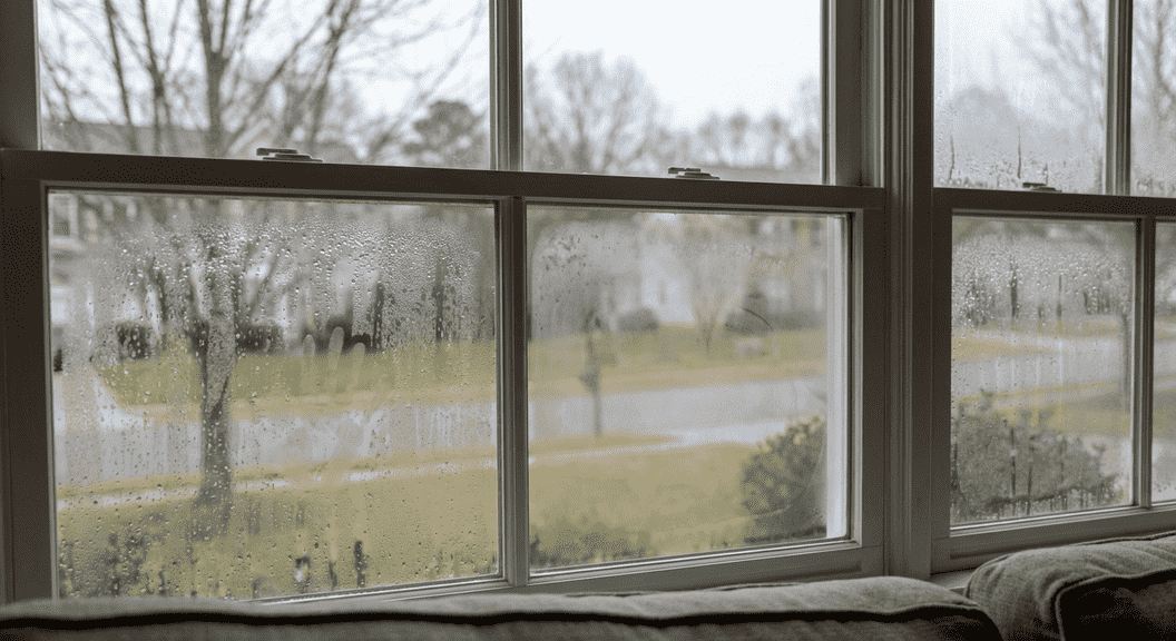 Foggy residential window showing condensation and failed seal